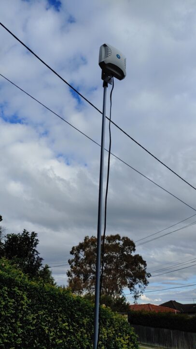 Telescopic pole with antenna on top