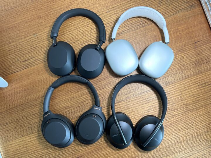 4 different headphones on desk