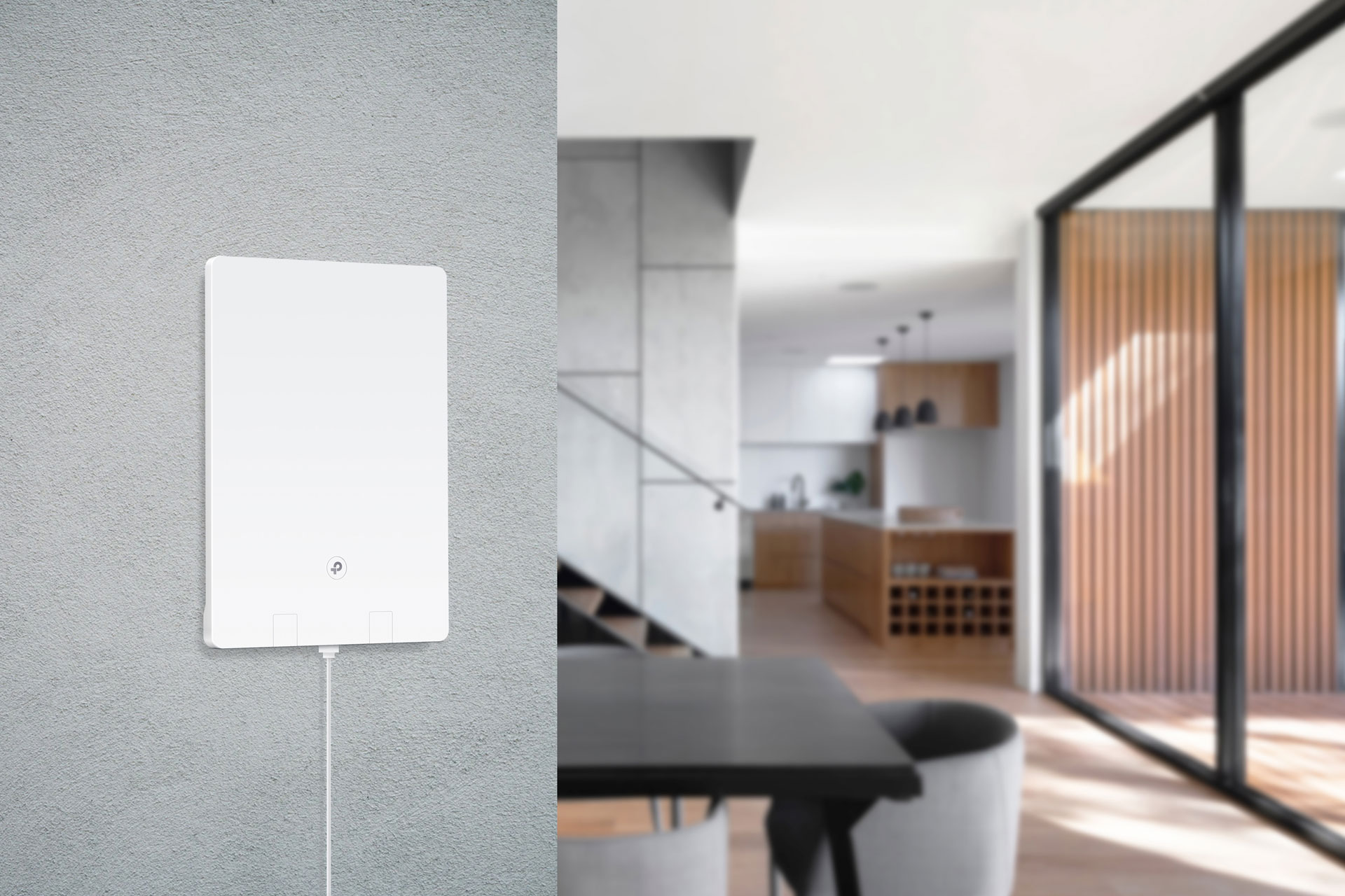 Tp-Link Archer Air R5 on wall in foreground of stylish modern living room interior.