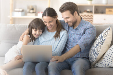 Family using a laptop
